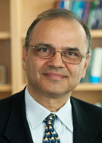 headshot photo of Farrokh Alemi wearing glasses and professional attire