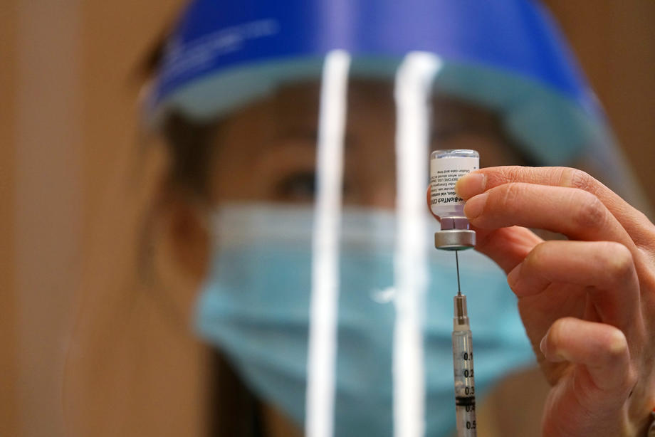 Nurse giving vaccine