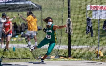 Image of Casey Nelson throwing a shot put
