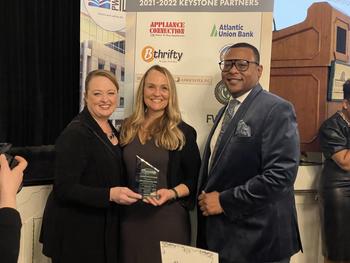 MAP clinic employees accepting award